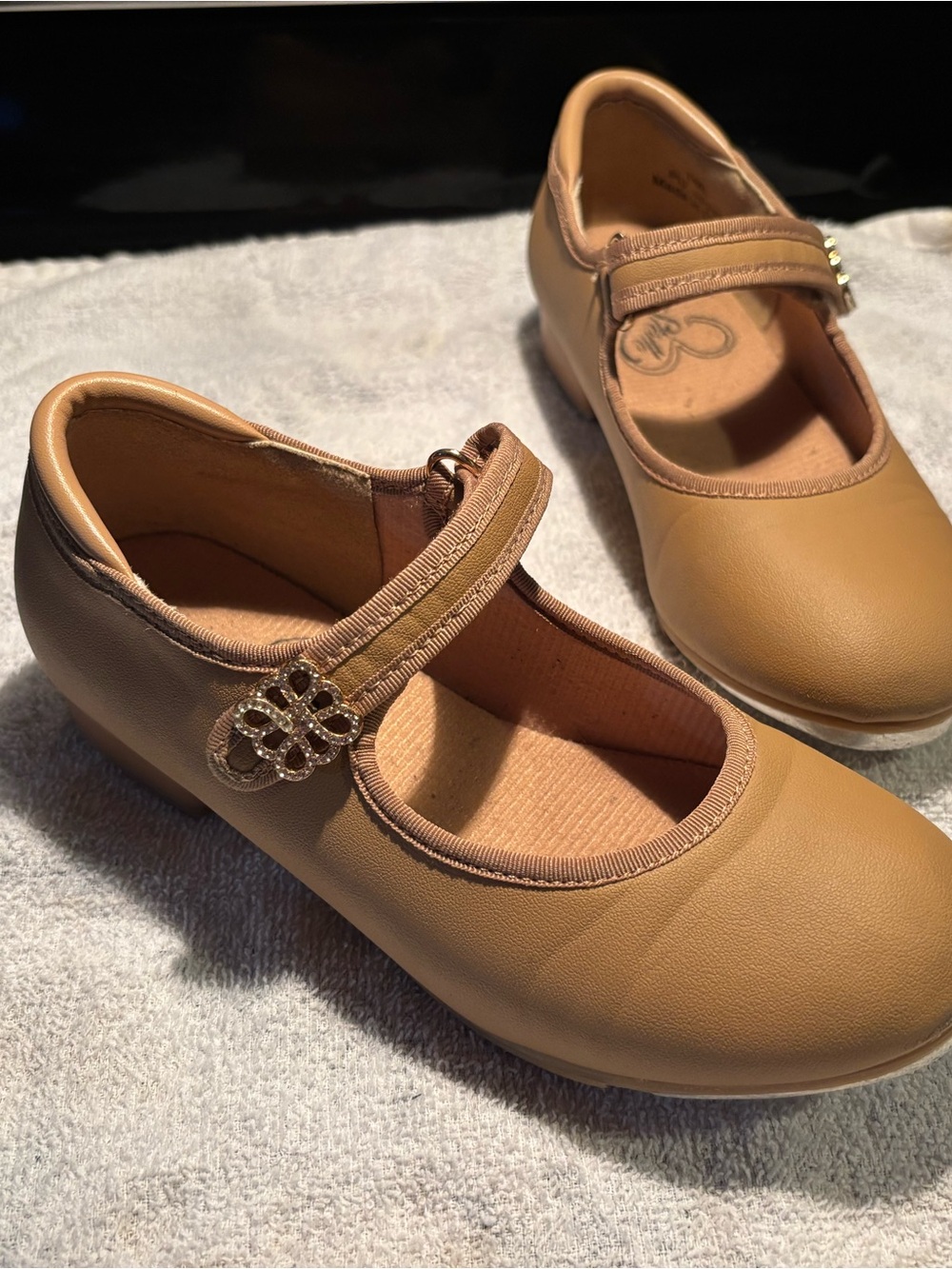 Stelle girls tan tap shoes with Velcro closure, pink ballets free with purchase
